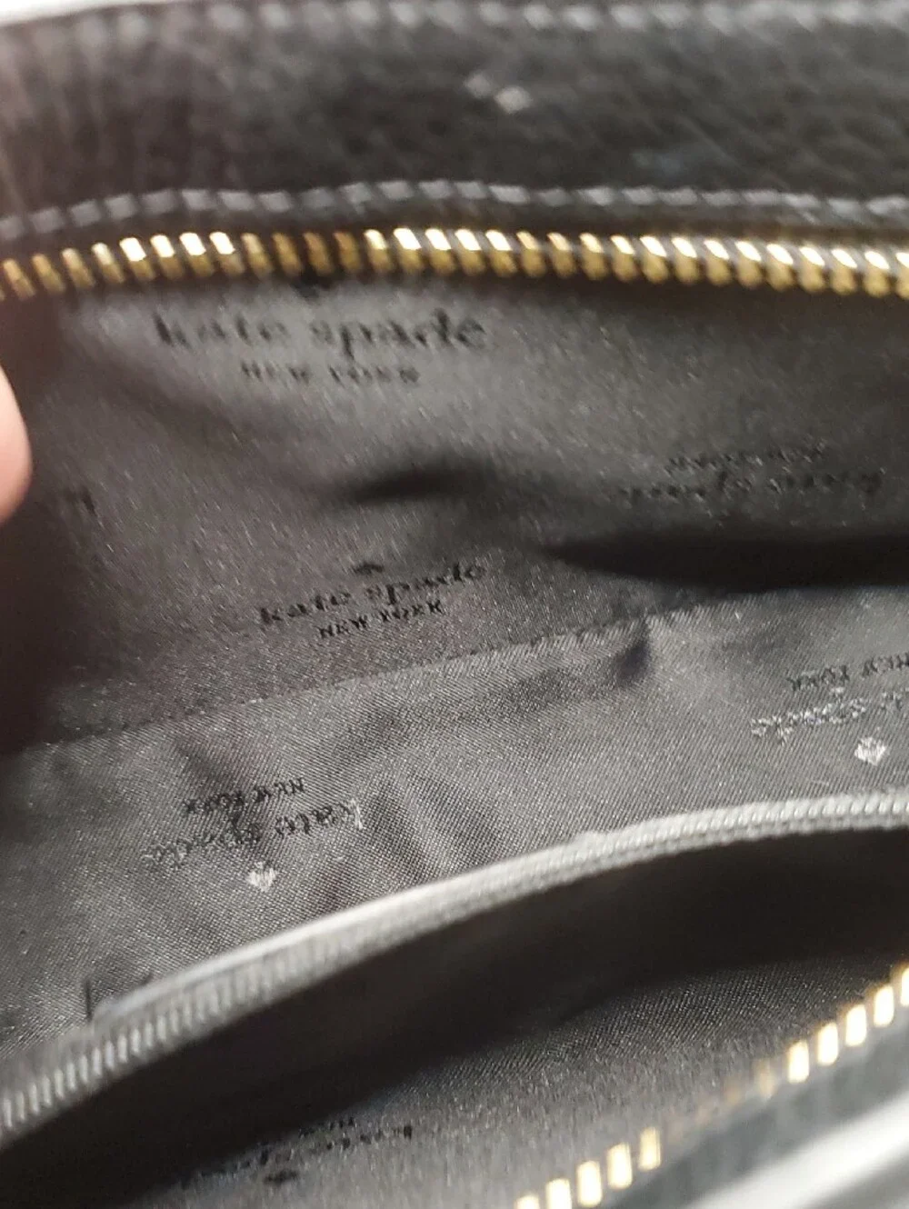 Kate Spade black pebbled leather shoulder bag with gold logo
